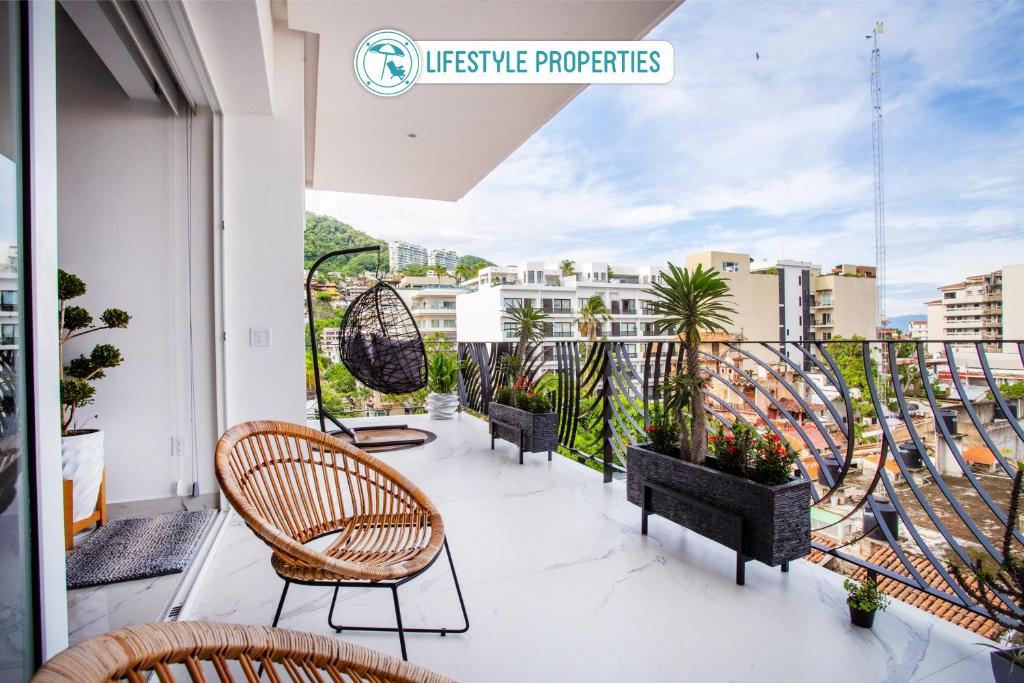 Lounge on big balcony, pool and gym, Puerto Vallarta