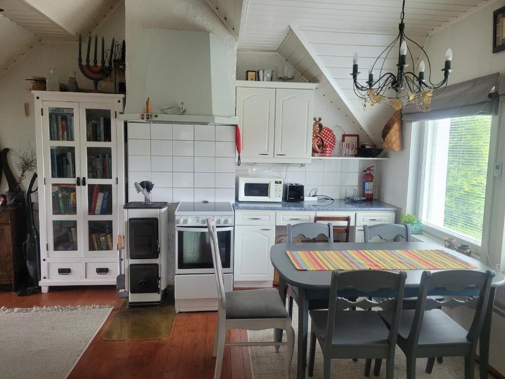 Guesthouse Onnia, kattohuoneisto Siurossa 5
