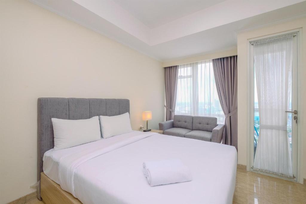 Nice and Cozy Studio at Menteng Park Apartment By Travelio, Jakarta