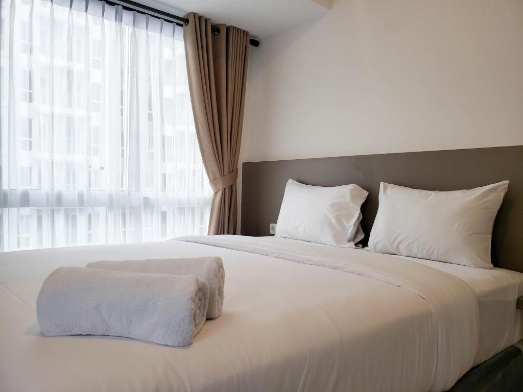 Nice and Elegant 2BR at 35th Floor Tokyo Riverside PIK 2 Apartment By Travelio, Rawalembang