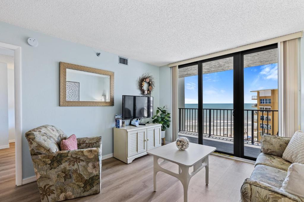Ocean View with a beachfront pool at Ocean Trillium Condo ~ 701, New Smyrna Beach