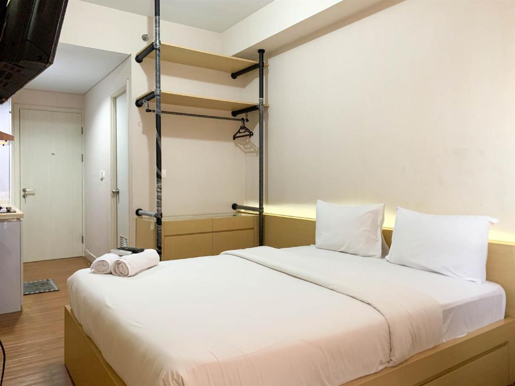 Relaxing Studio at Patraland Urbano Apartment By Travelio, Bekasi