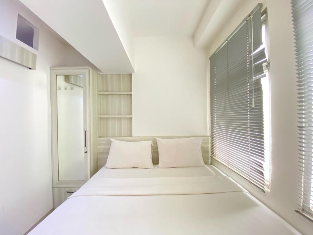 Modest 2BR at Jarrdin Cihampelas Apartment By Travelio, Bandung