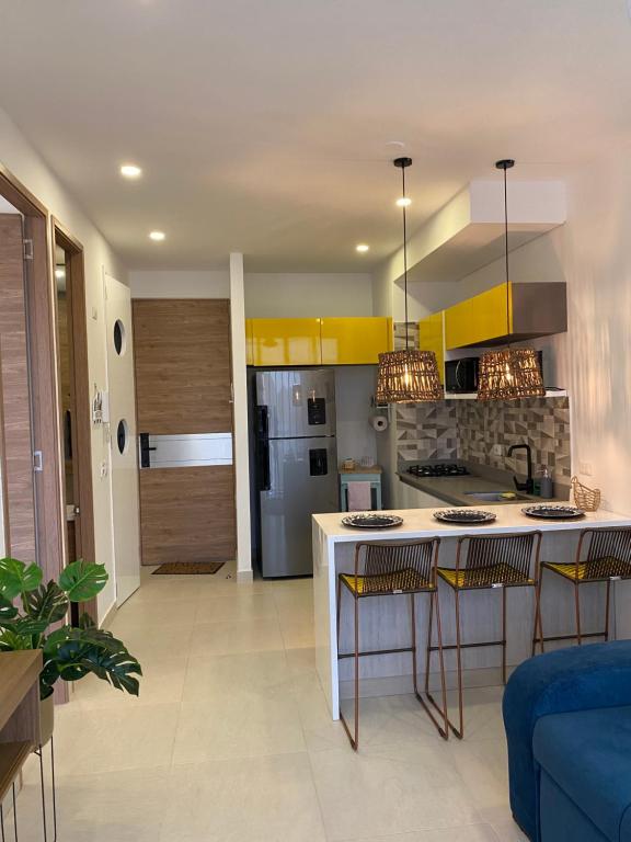ApartaSuite-Pozos Colorados-vista al Mar-2 camas-2 baños - 2