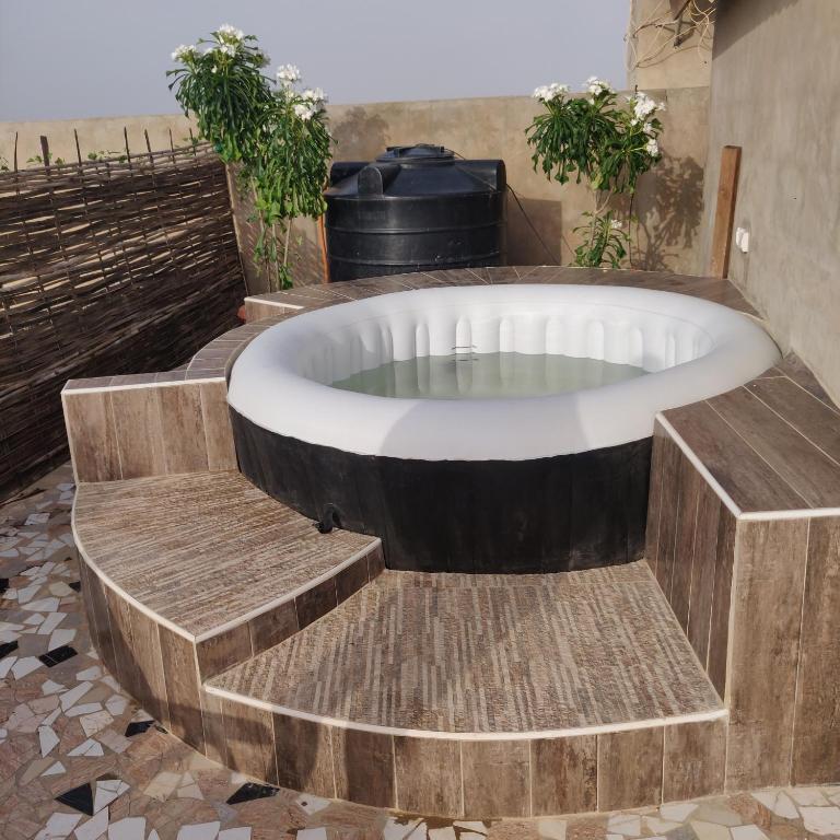 Villa Malya-Rez de chaussée Privé et indépendant avec deux chambres et jacuzzi dans une maison-, Saly Portudal