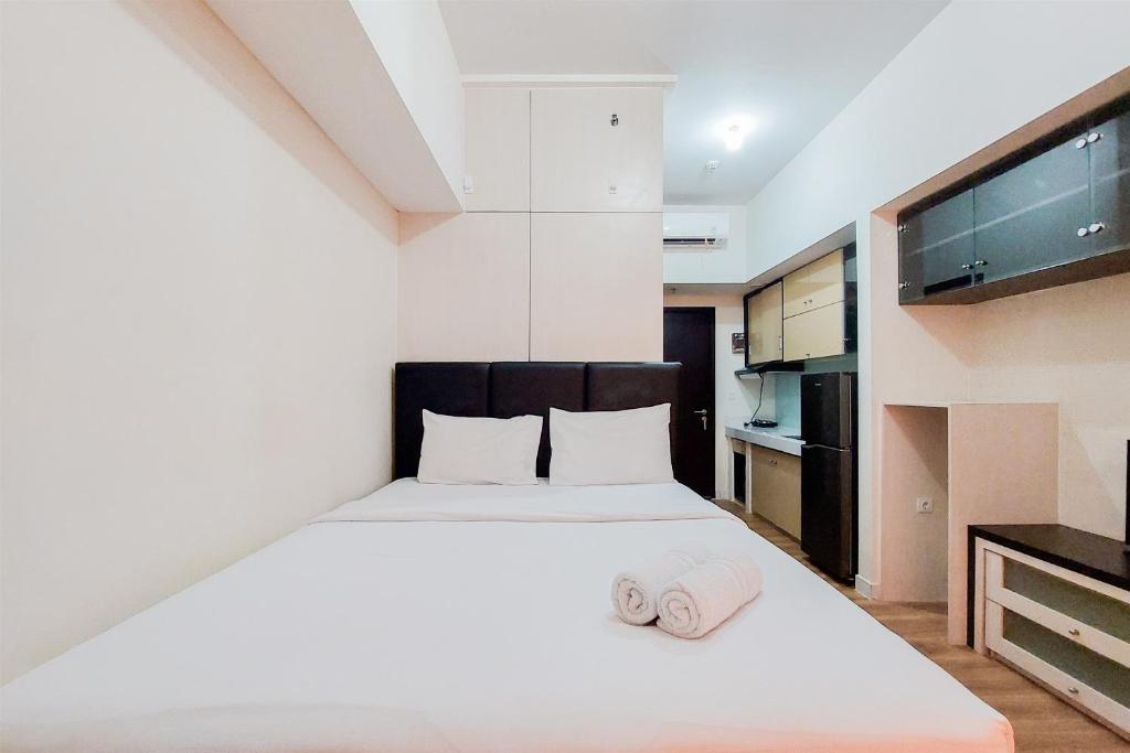 Simply and Modern Studio at Casa de Parco Apartment By Travelio, Tangerang