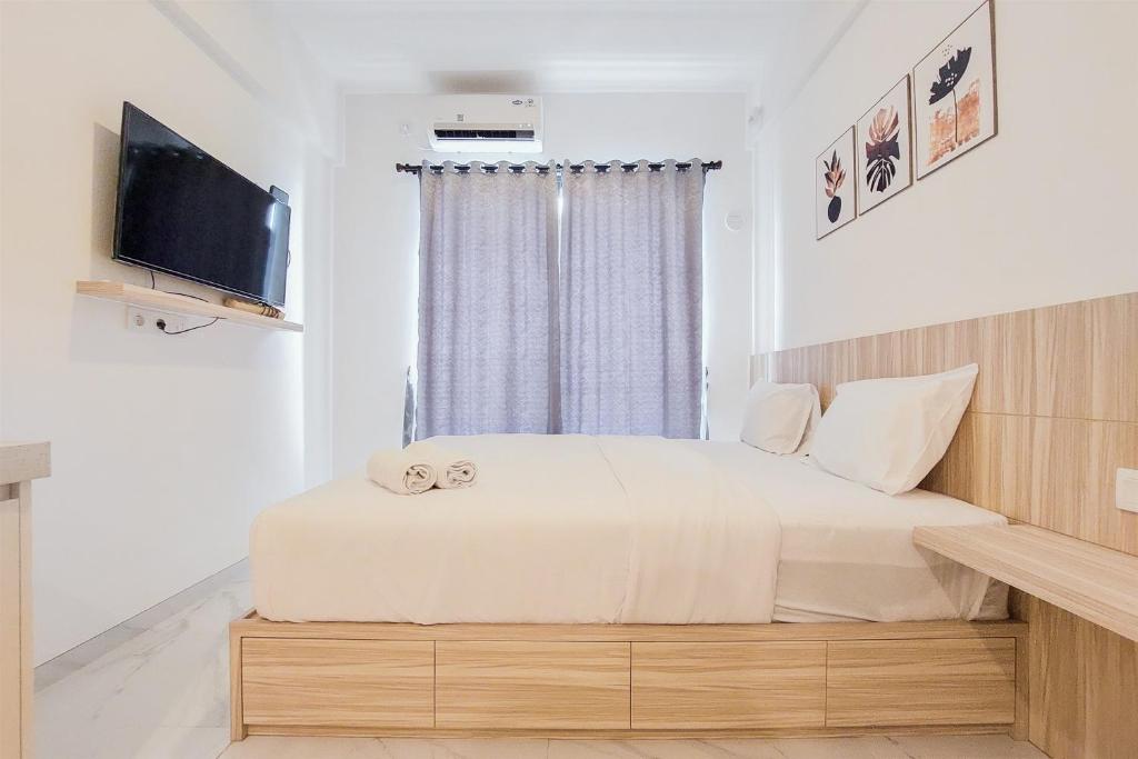 Functional Studio at Sky House BSD Apartment near AEON MAll By Travelio, Tangerang