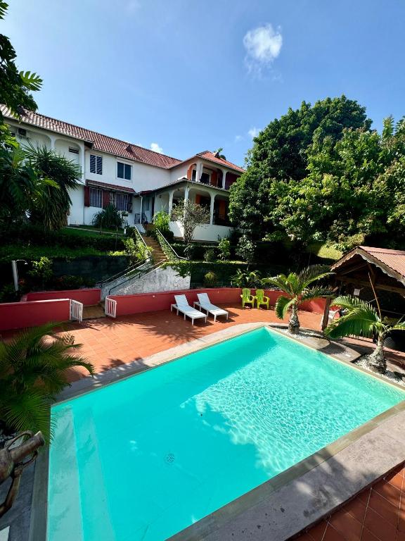 La Canopée Enchantée, chambres d'hôtes, piscine, proche aéroport, Gare maritime, Les Abymes