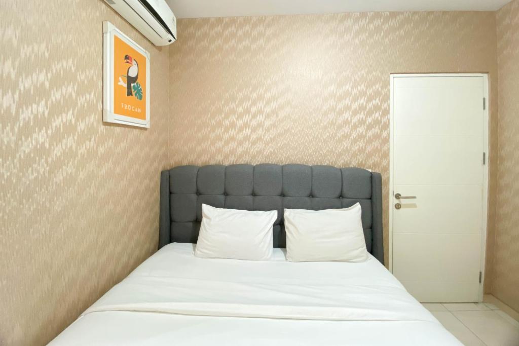 Comfort and Elegant 4BR Combined at Springlake Summarecon Bekasi Apartment By Travelio, Bekasi