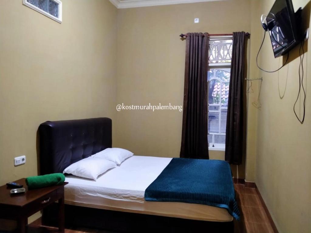 Rian Kost - Hotel Penginapan Murah Pusat Kota Palembang, Palembang