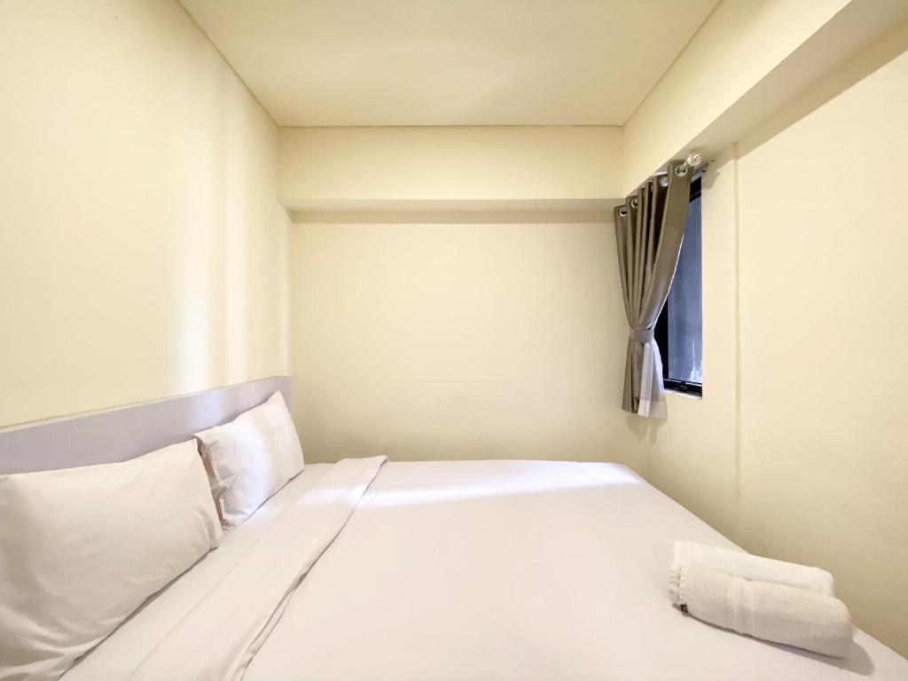 Tranquil Designed 2BR at Meikarta Apartment By Travelio, Cikarang