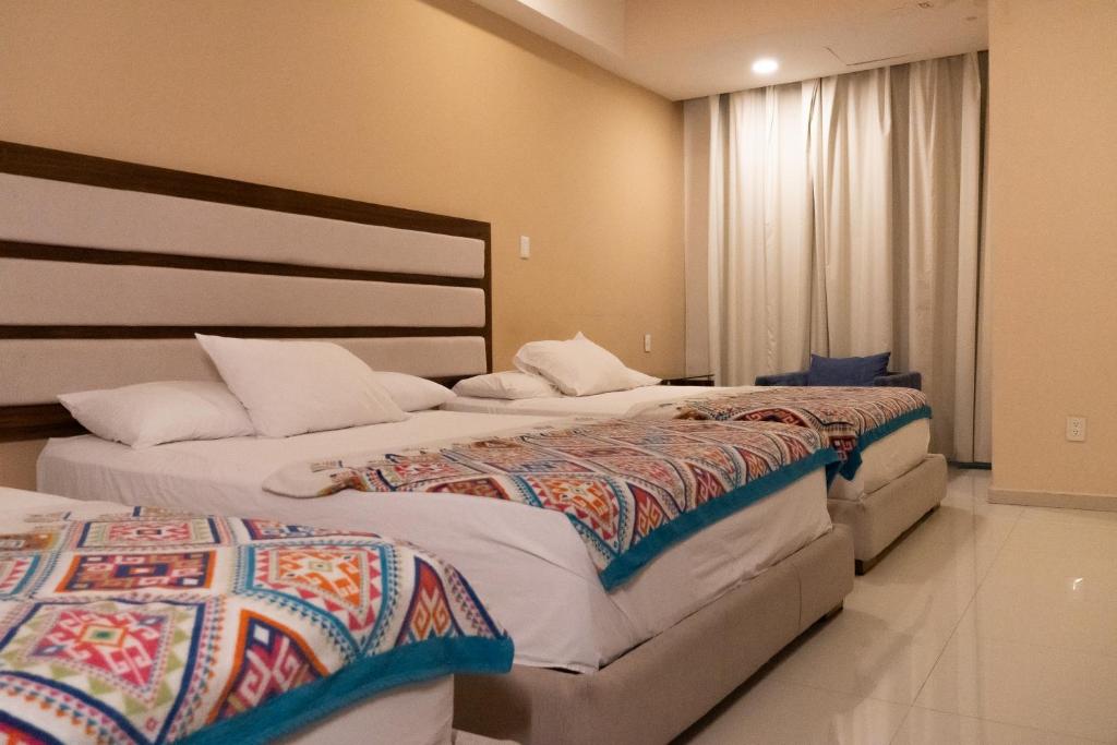 Infinity Suites Habitación Triple 211 - 2