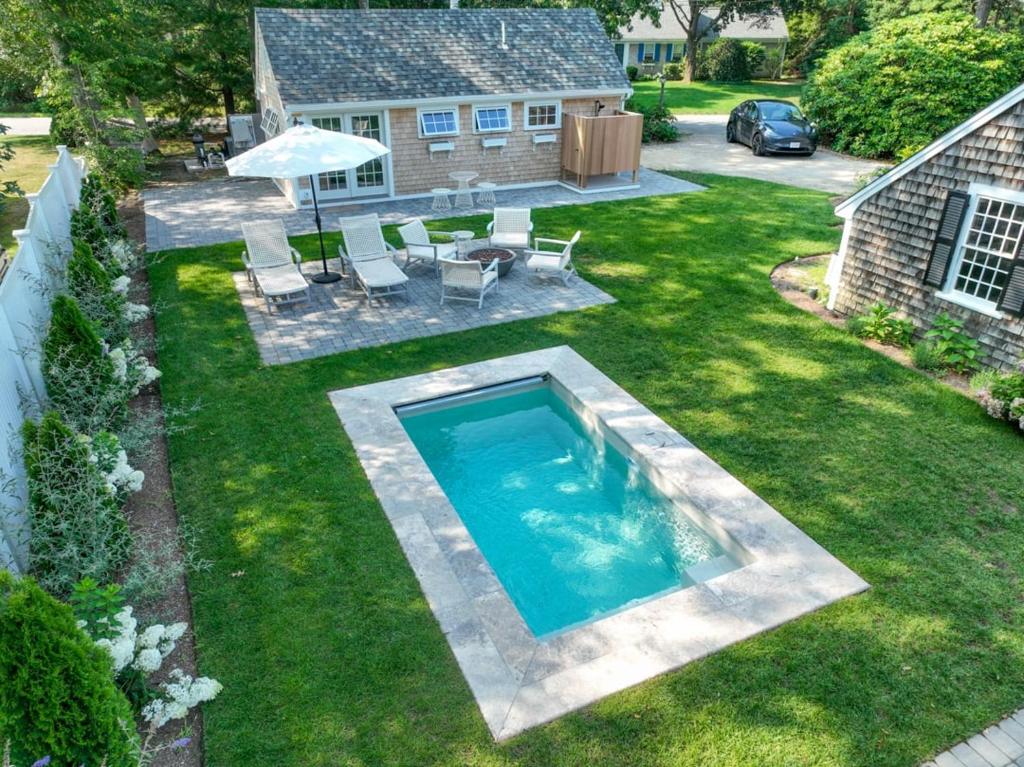 Swing Set Plunge pool and large yard await, Barnstable