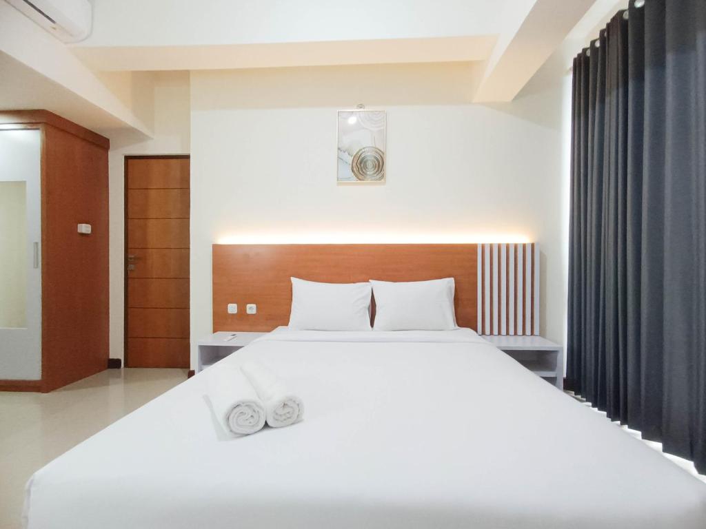Spacious and Comfortable 3BR Vida View Makassar Apartment By Travelio, Pampang