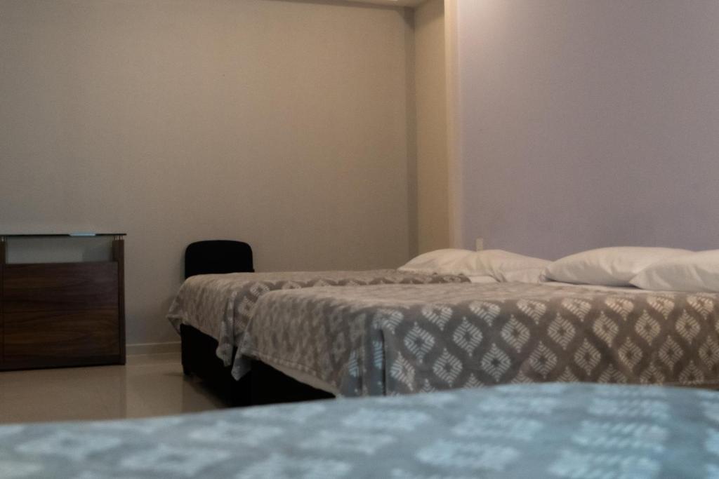 Infinity Suites triple room 212, Cancún