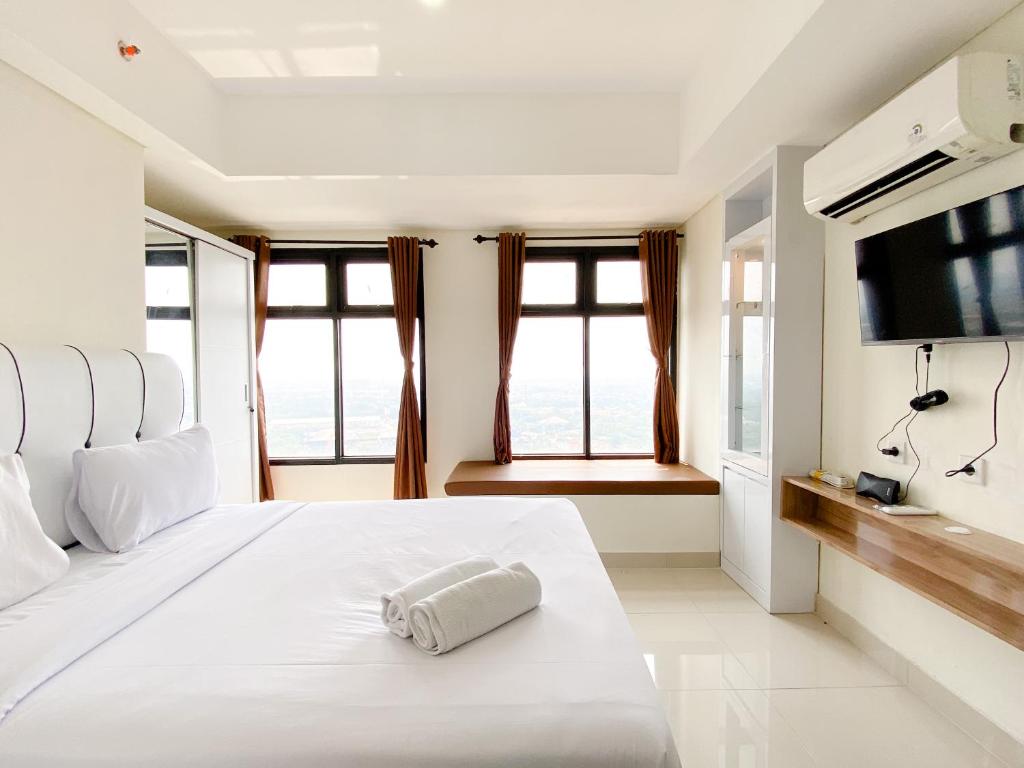 Modern Look Studio at Pollux Chadstone Apartment By Travelio, Cikarang