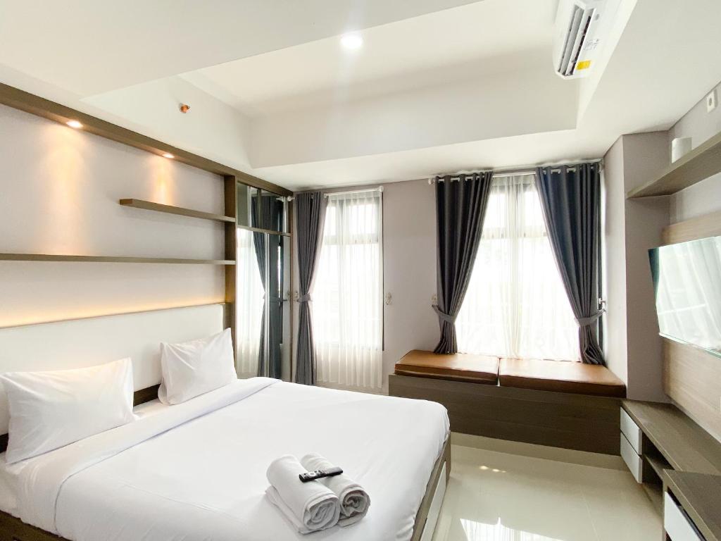Modern and Comfy Studio at Pollux Chadstone Apartment By Travelio, Cikarang