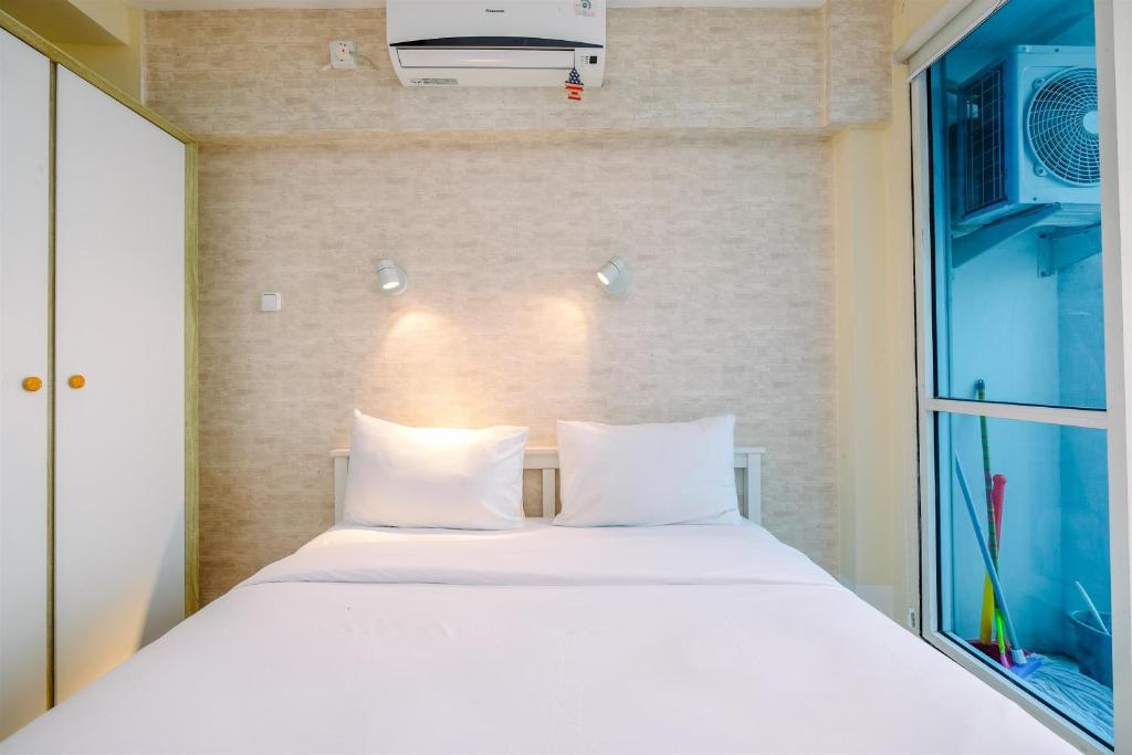 Minimalist Studio with Great City View at Tifolia Apartment By Travelio, Jakarta