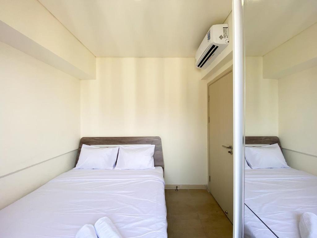 Homey and Minimalist 2BR at Meikarta Apartment By Travelio, Cikarang