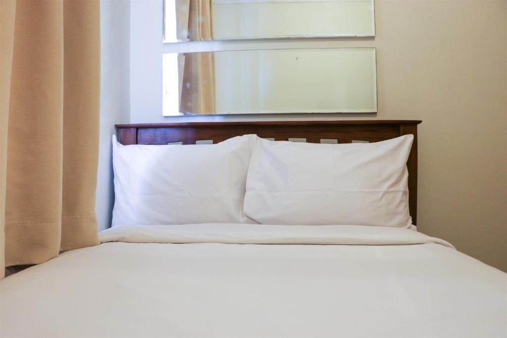 Nice and Elegant 2BR at Grand Palace Kemayoran Apartment By Travelio, Jakarta