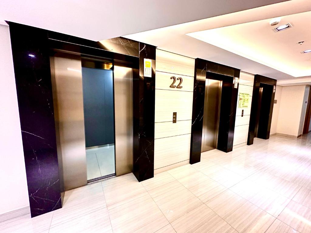 From 14 High Rise Condo with Balcony Pool Grand Lobby and Sky