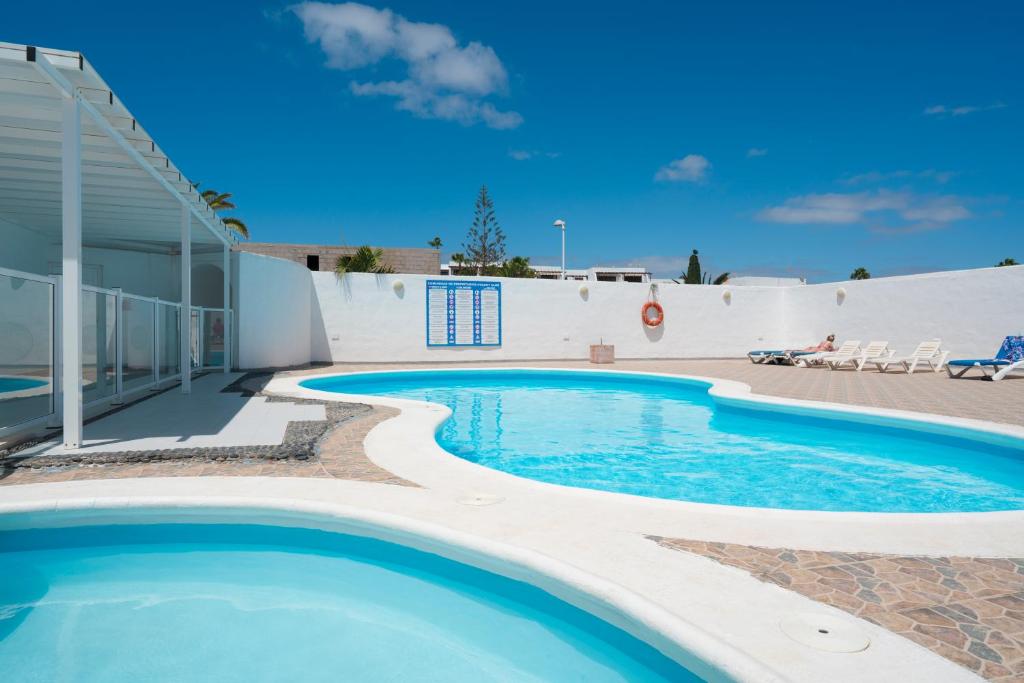 Casa Picon en Puerto del Carmen, con terraza, vistas al mar, piscina y junto a la playa - 5