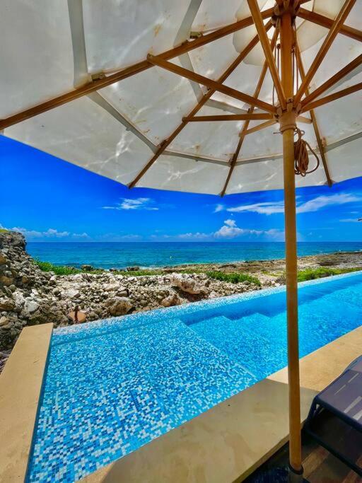 Tulum Oceanfront Condo with 24hr pool, Akumal