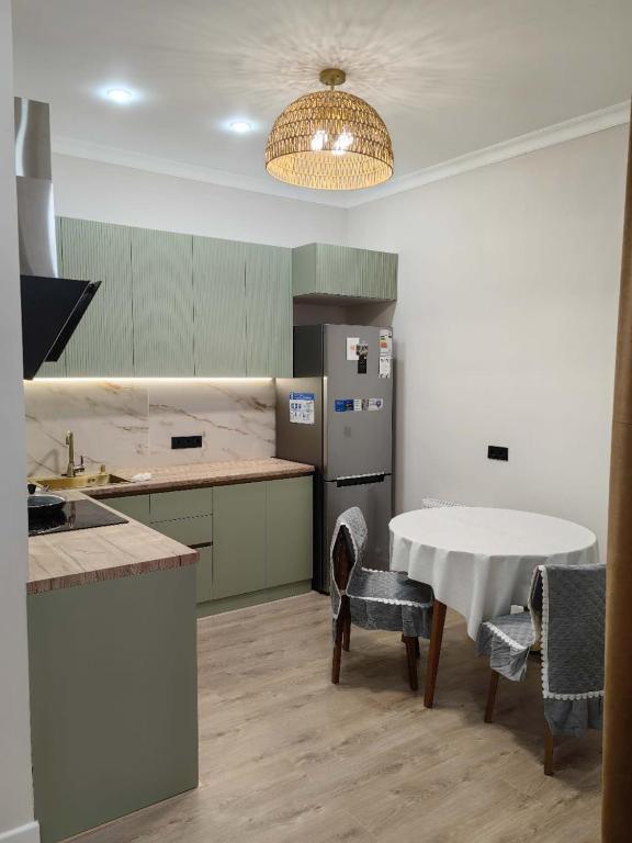 Студия у ледового дворца Алау, Taldykolʼ