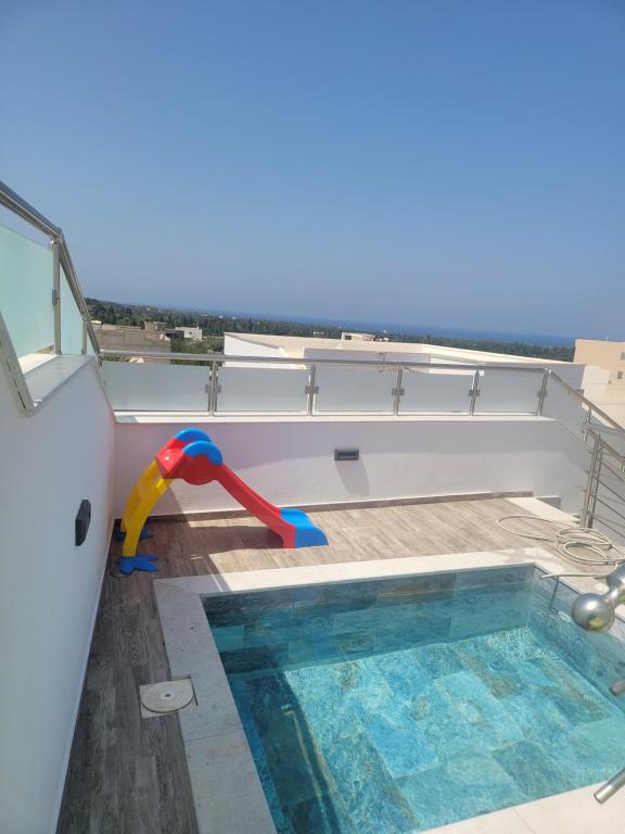 Appartement avec piscine vue sur mer, Raʼs al Jabal