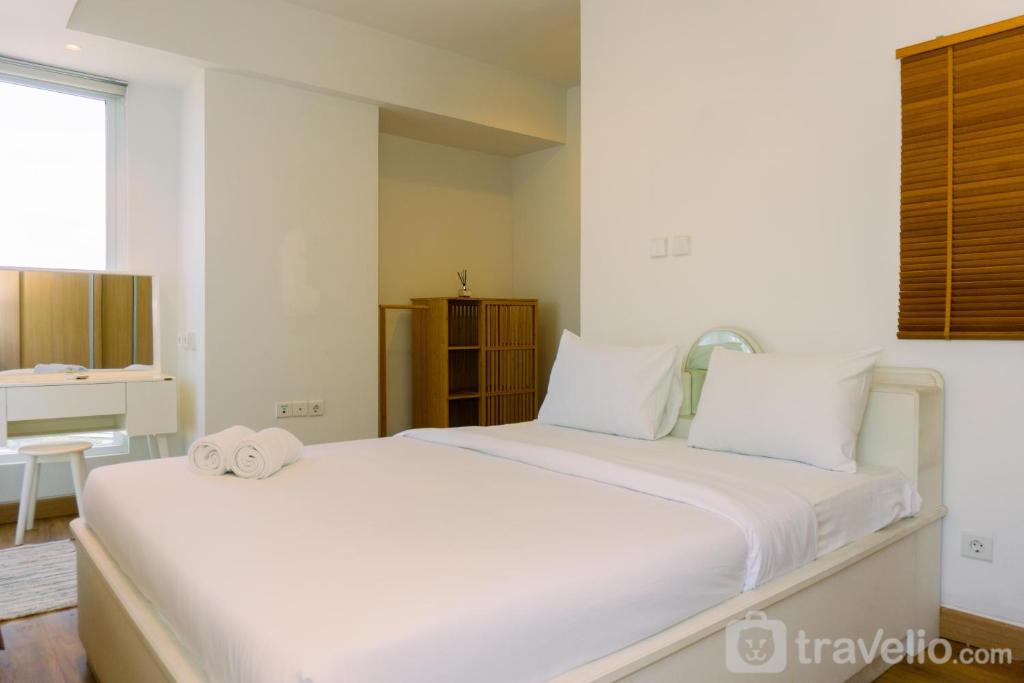 Spacious 1BR with Japandi Design at West Vista Apartment By Travelio, Jakarta