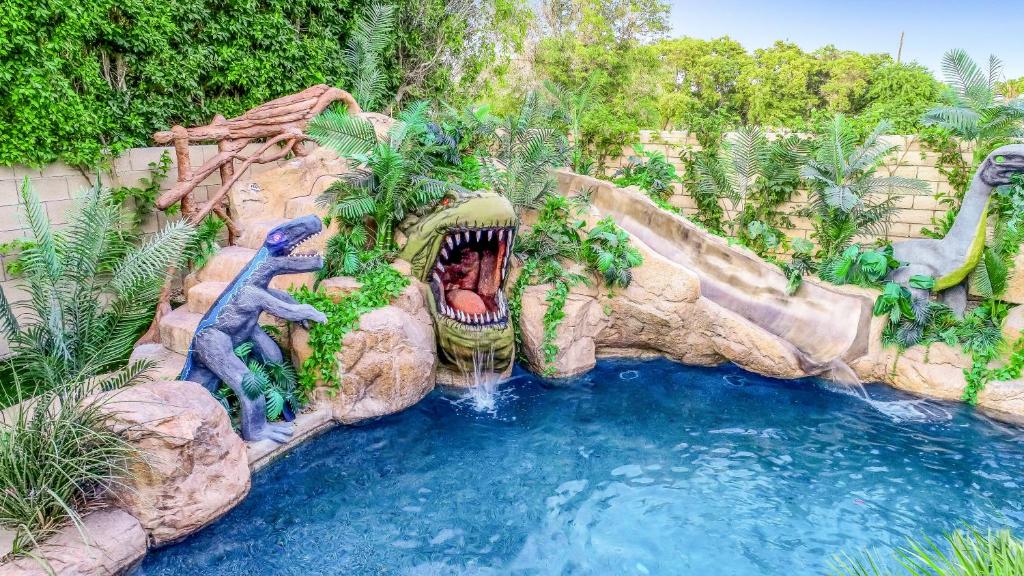 Bomb Dot Com with Dinosaur Waterslide, Indio