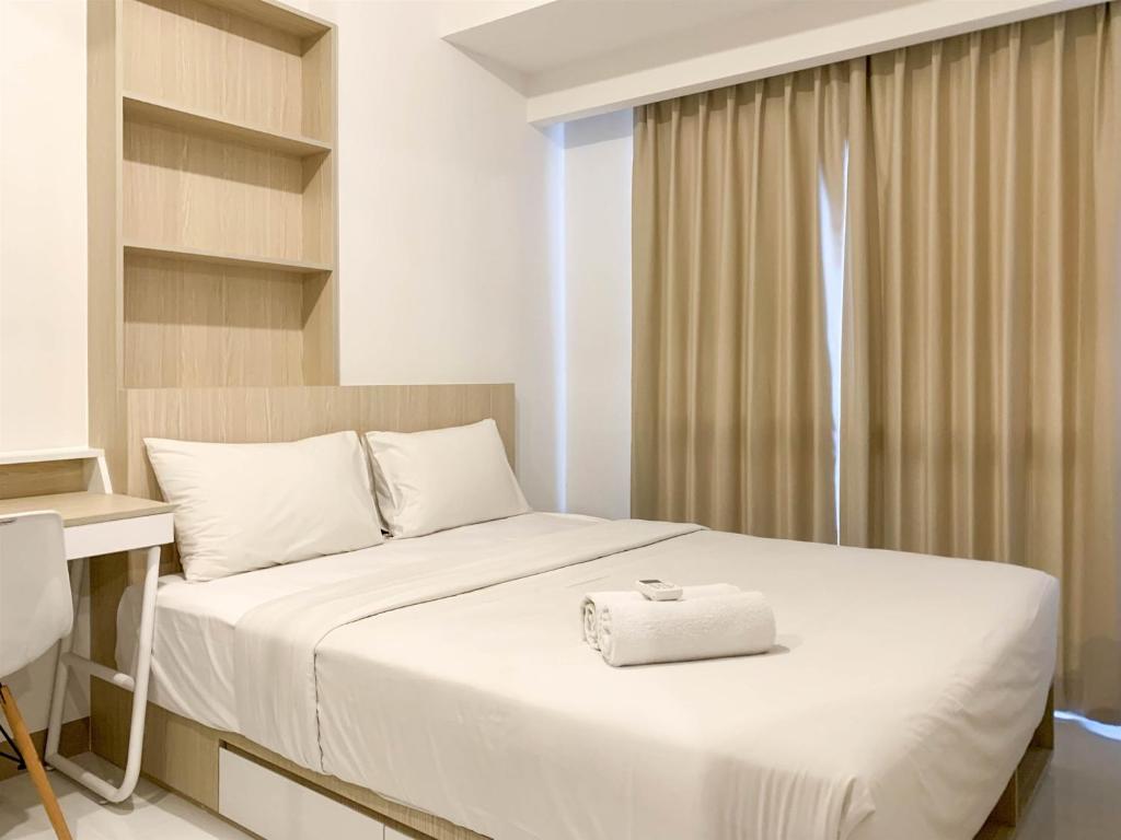 Homey and Functional 2BR Tokyo Riverside PIK 2 Apartment By Travelio, Rawalembang