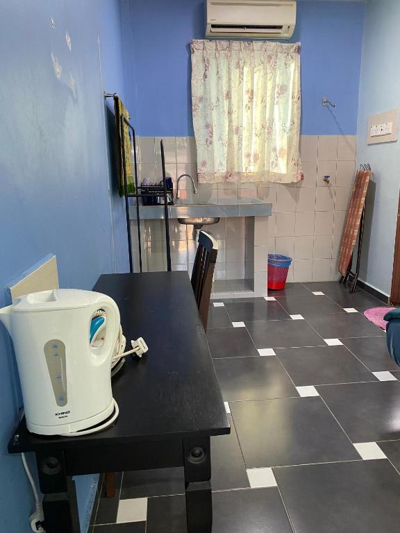 Kitchen, Ayem Homestay in Batu Pahat