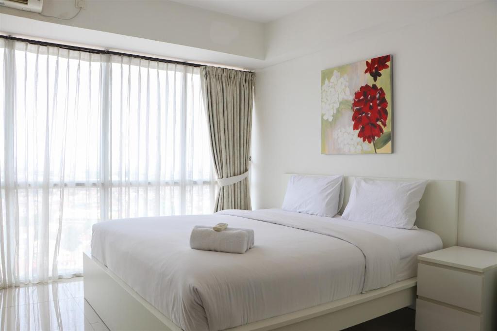Fancy and Nice 1BR Apartment at H Residence By Travelio, Jakarta