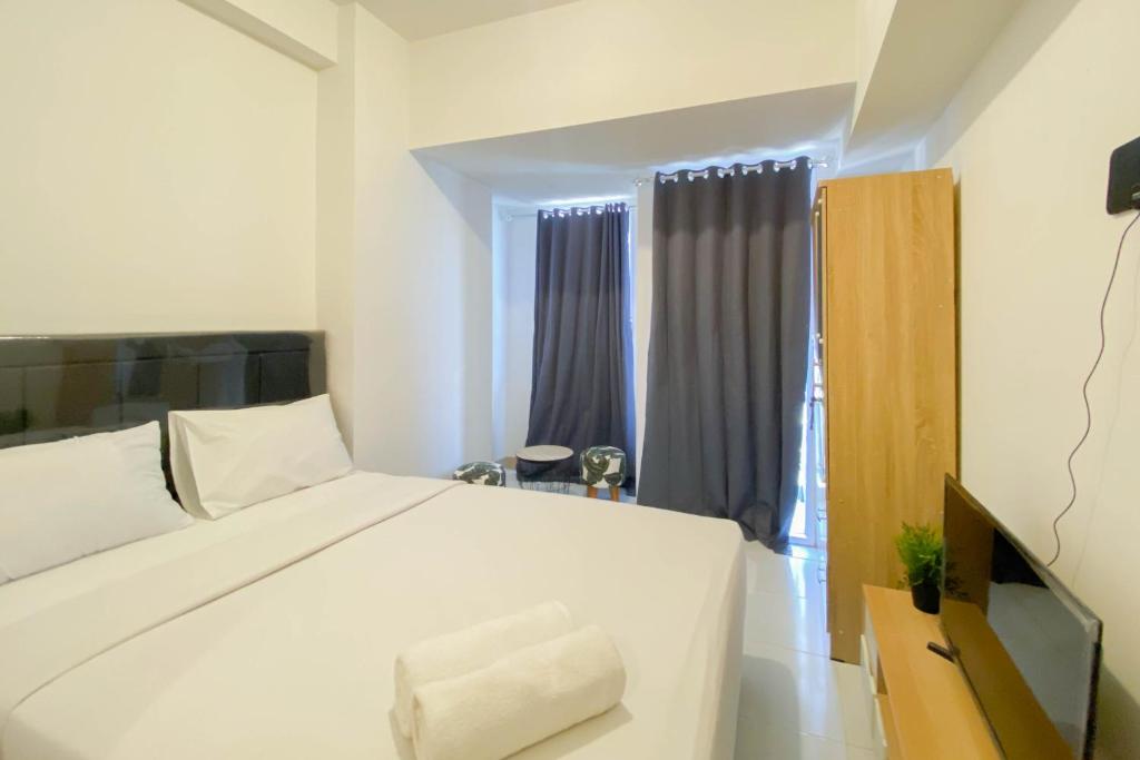 Studio Furnished with Comfort Design at Tokyo Riverside PIK 2 Apartment By Travelio, Rawalembang