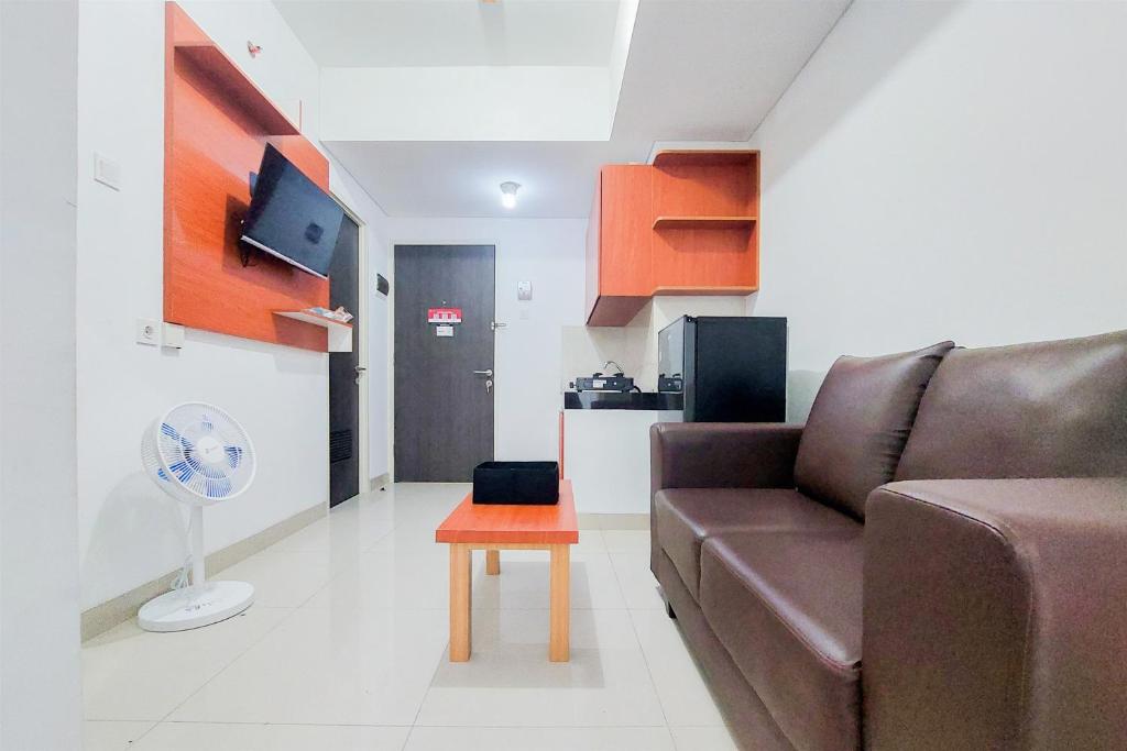 Warm and Minimalist 2BR at Serpong Garden Apartment By Travelio, Tangerang