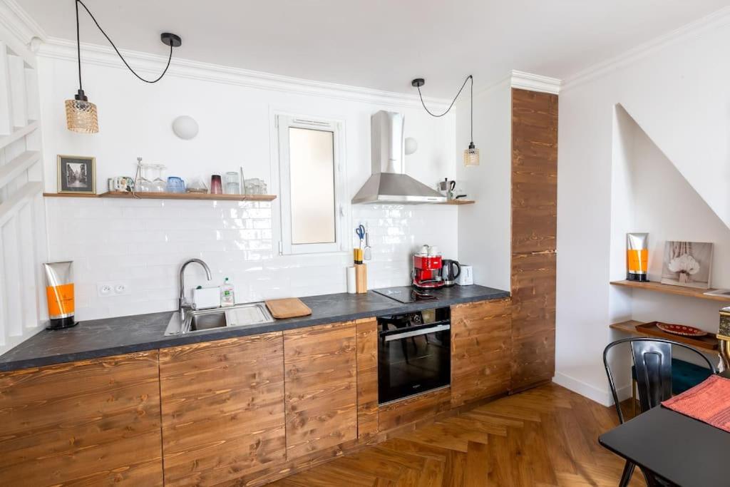 Appartement contemporain rénové dans le centre de Paris - 5