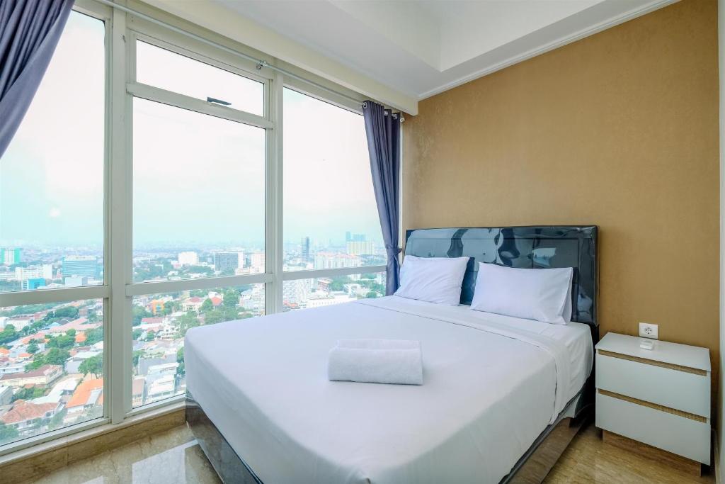Modern Look and Comfy 2BR at Menteng Park Apartment By Travelio, Jakarta