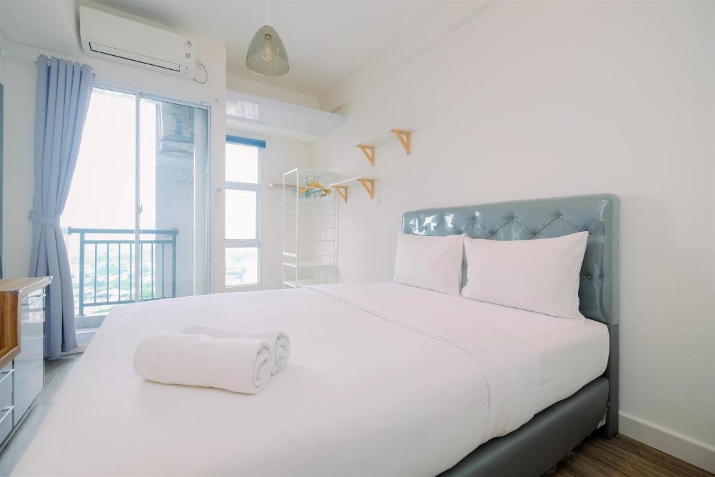 Comfy and Well Design Studio at Akasa Pure Living BSD Apartment By Travelio, Tangerang