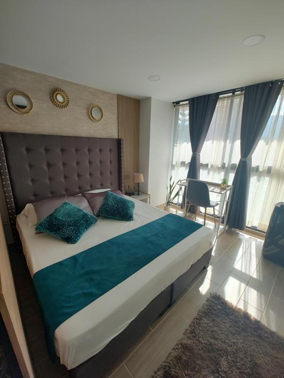 Metro floresta acogedor apartaestudio, Медельин