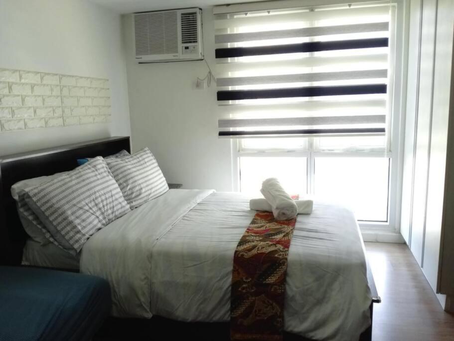 Abreeza Studio Suite T1-1917 - AC, Wifi, Kitchen, Pool, Washer, Davao