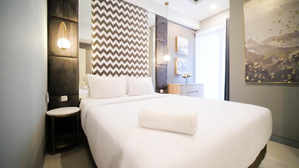 Simple 2BR Connected to Mall at Anderson Supermall Mansion Apartment By Travelio, Surabaja