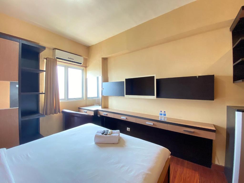 Cozy Studio Room at Suites @Metro By Travelio