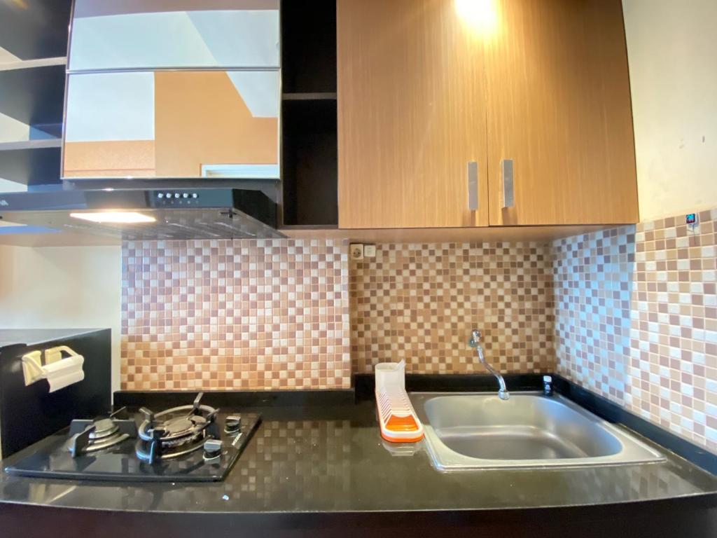 Cozy Studio Room at Suites @Metro By Travelio