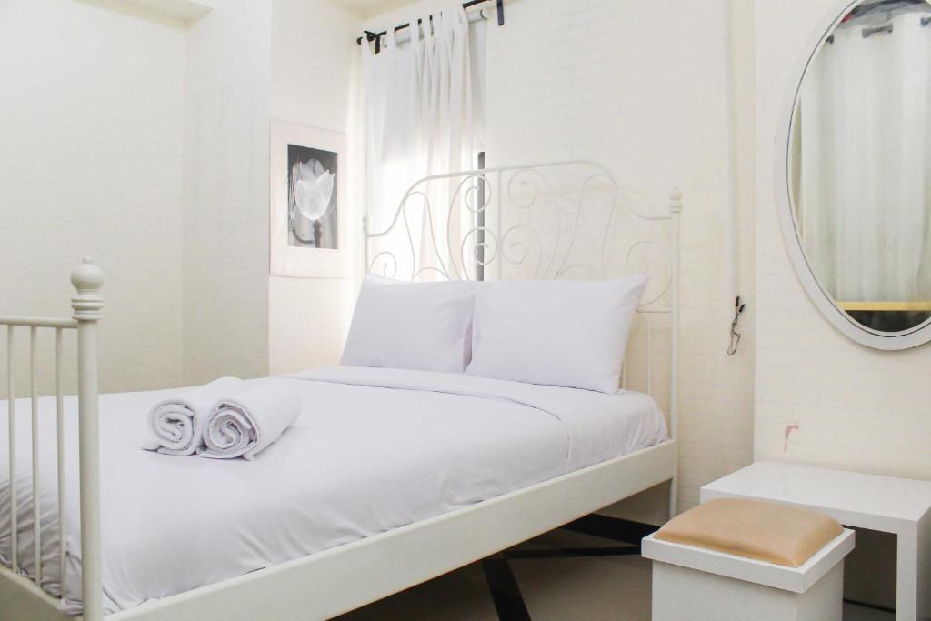 White and Nice 1BR at Bassura City Apartment By Travelio, Jakarta