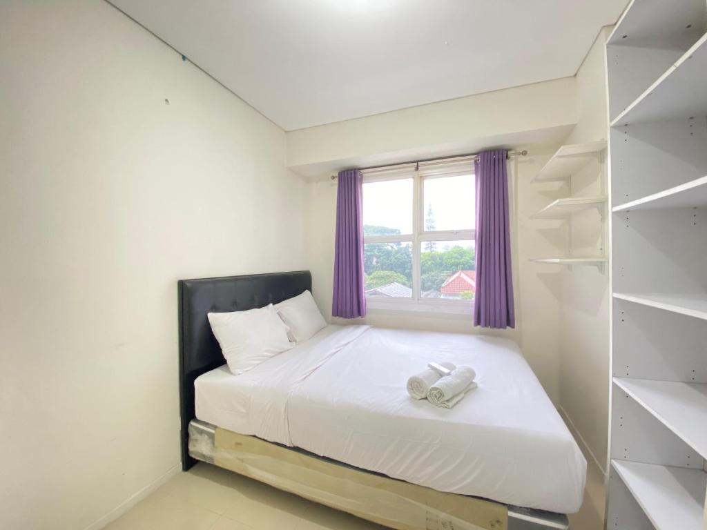 Relaxing 1BR Apartment at Parahyangan Residence near Parahyangan University By Travelio, Bandung