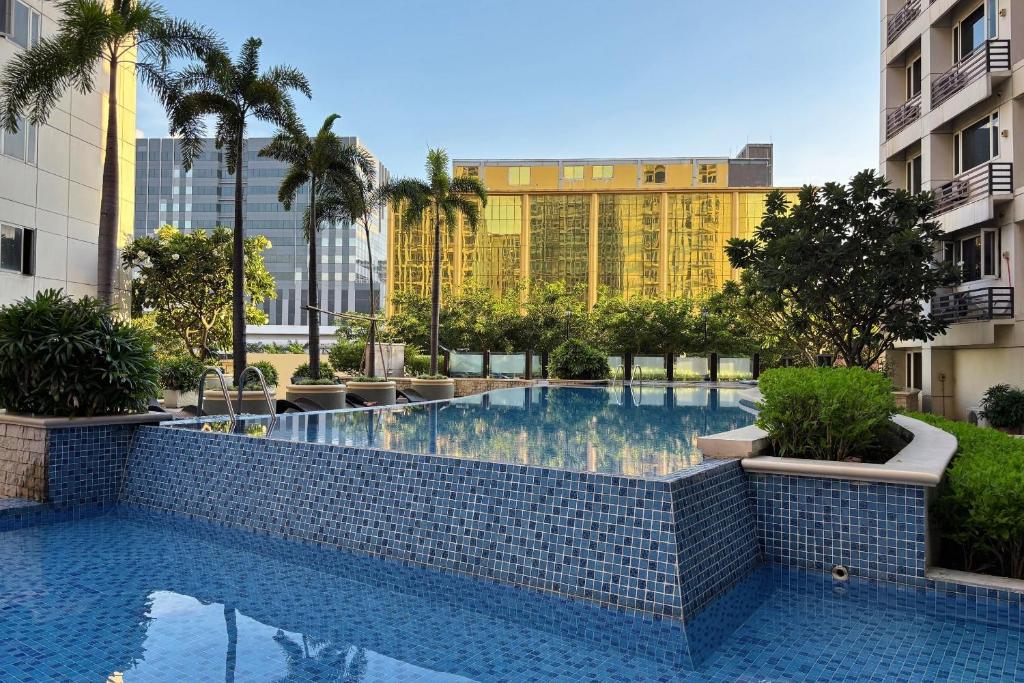 Swimming pool, Extremeli Suites in Manila