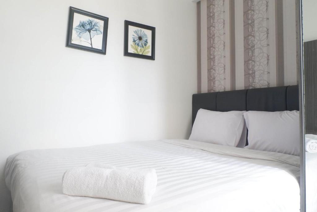 Best Deal and Comfy 2BR Apartment at Puri Mas By Travelio, Surabaya
