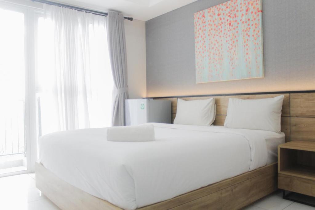 Best Studio Unit with Pool View Casa De Parco Apartment By Travelio, Tangerang