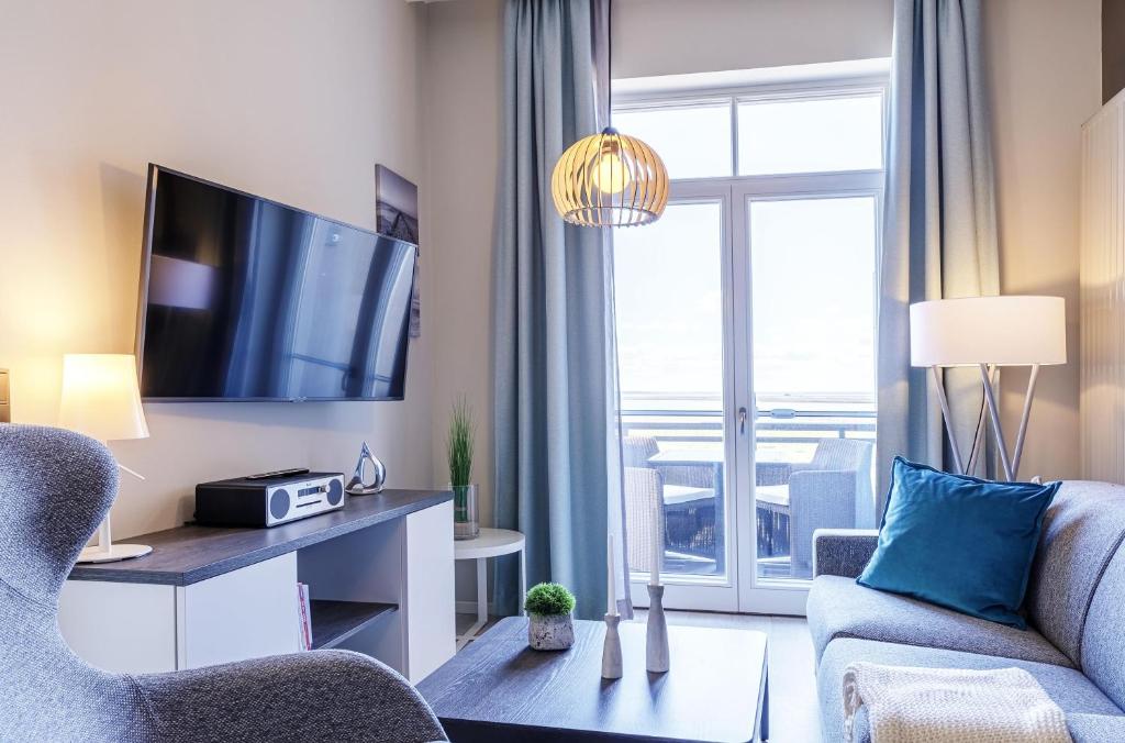 Ostseestern - 5-Sterne Ferienwohnung mit Südbalkon am Bodden, Wustrow